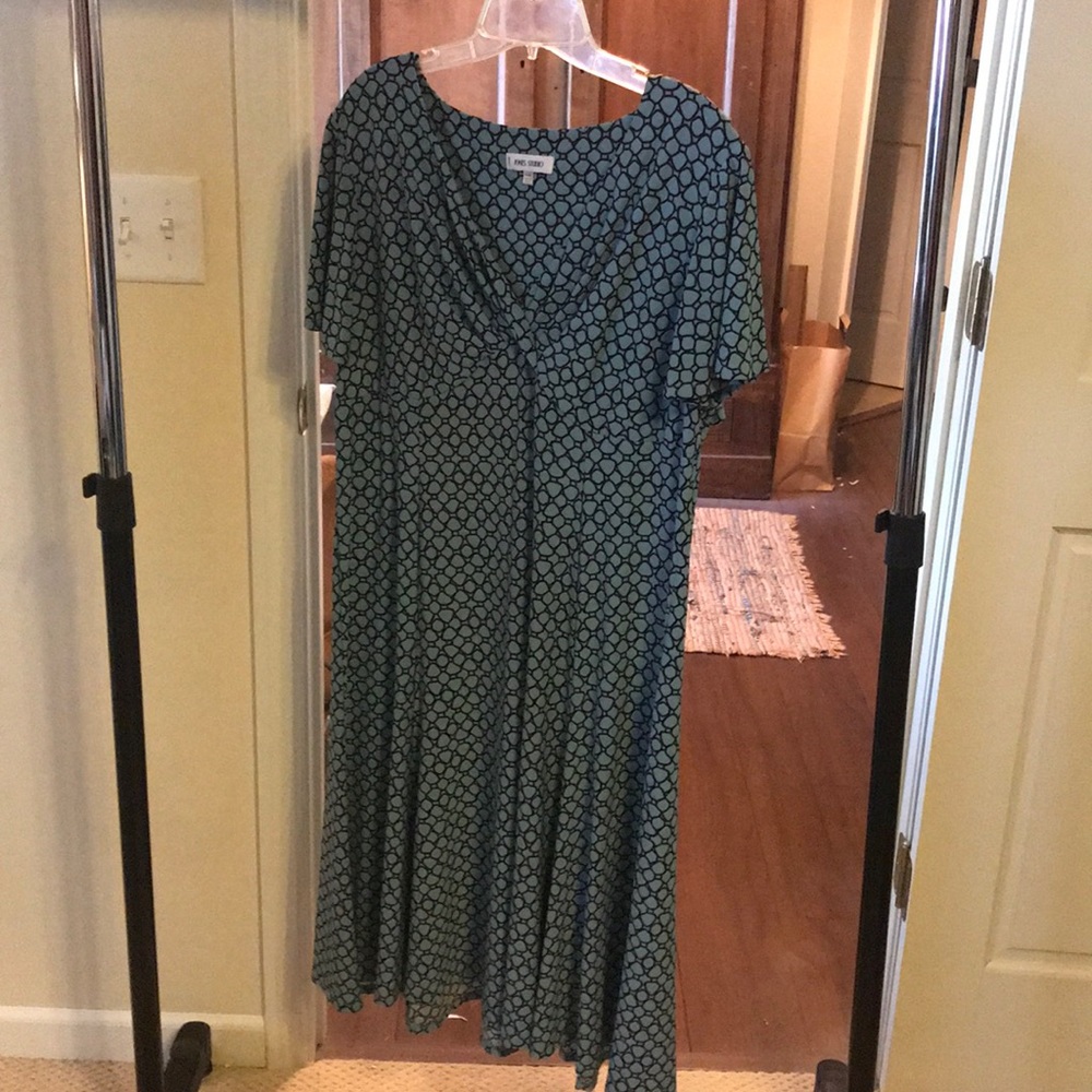 Light blue and black patterned dress. 60s style.